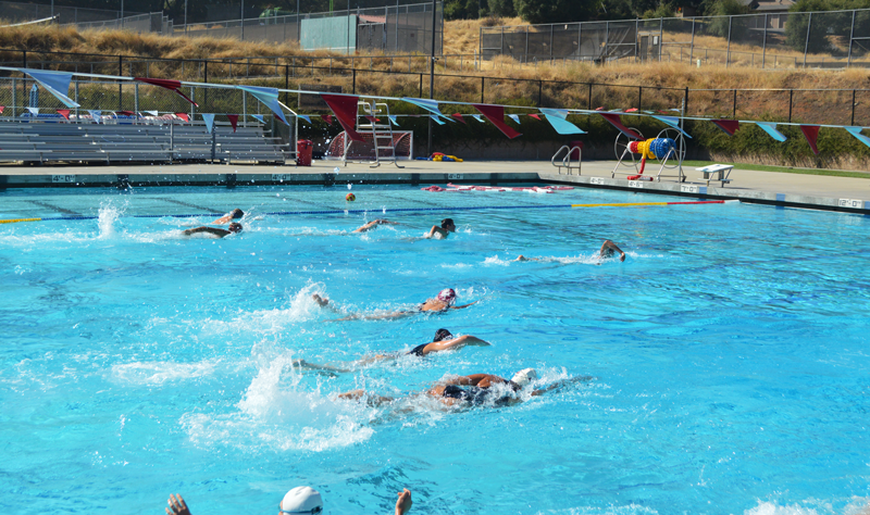 The Water Polo team warms up. Photo by Jared Pittsley