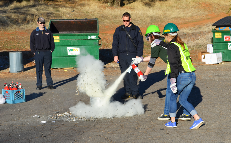 Bruins in the CERT program practice using a fire extinguisher in 2014. Courtesy photo