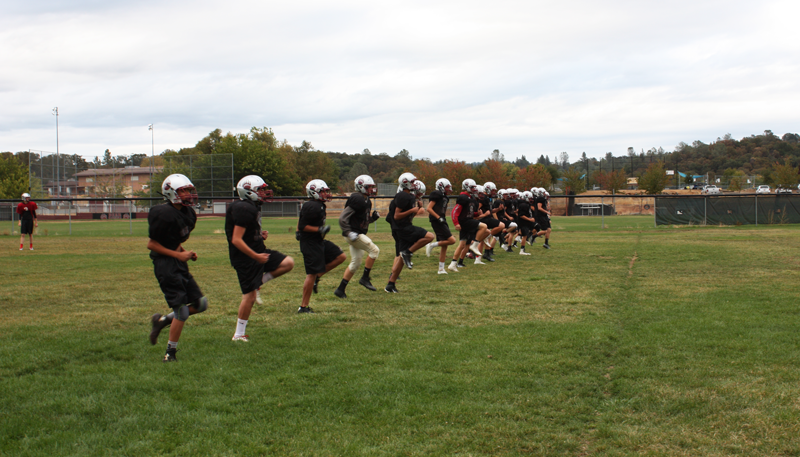 The+JV+football+team+were+assigned+extra+conditioning+as+a+result+of+poor+grades.+Photo+by+Mia+Deen-Baum+