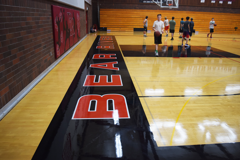 Justin+Dunkin%2C+a+sophomore%2C+walks+the+new+gym+floors+during+basketball+PE.+Photo+by+Jacob+Thrasher