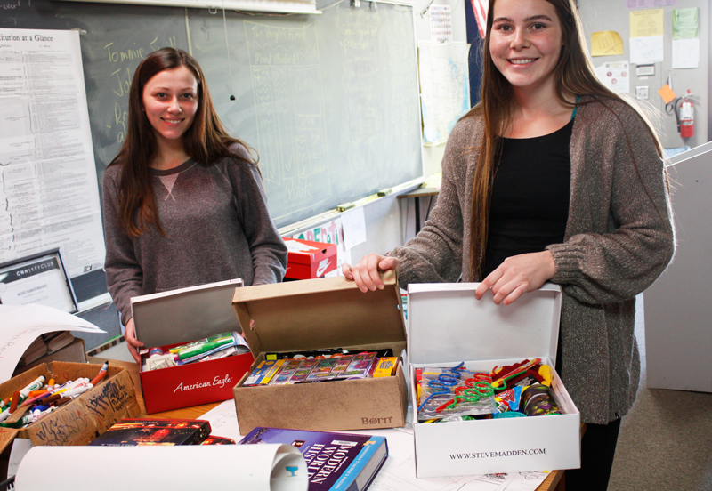 Seniors+Bridgitte+Anderson+and+Ella+Beardsley+took+part+in+Operation+Christmas+Child.+Photo+by+Jared+Pittsley