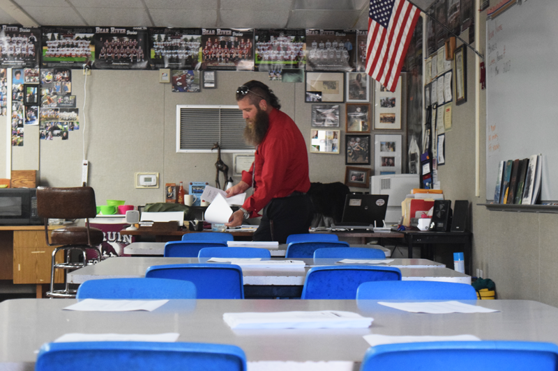 Computer Science Teacher Jason Bohrer sets up for an AP History test. Photo by Jared Pittsley