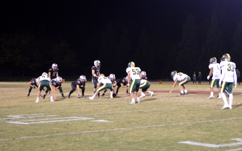 The+Varsity+Bruin+Football+Team+lines+up+for+a+play+against+the+Placer+Hillmen.+Photo+by+Morgan+Ham