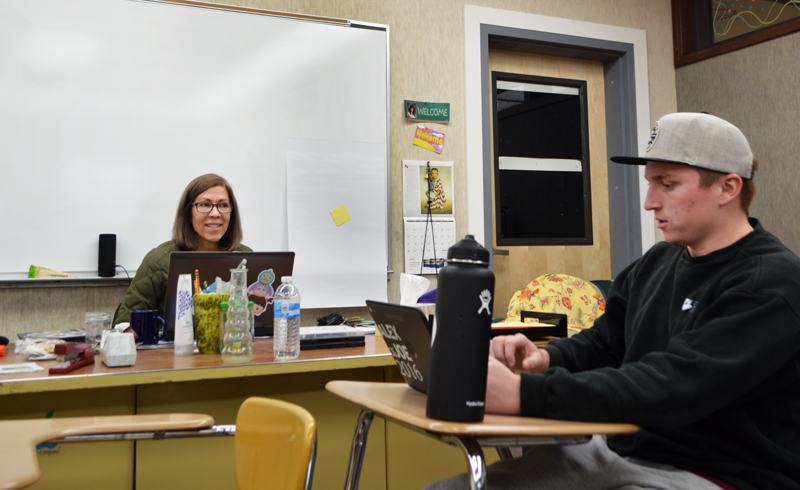 Dance Teacher Joyce Gouveia, in her classroom with Senior Jeremy Cunningham, has decided to stay on another year at Bear River. Photo by McKenna Hisaw