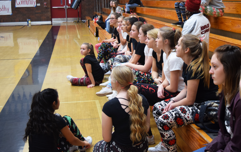 Bruin cheerleaders wearing holiday apparel wait to perform before a rally. Bear Rivers Winter Break falls later this year, affecting many students plans. Photo by McKenna Hisaw