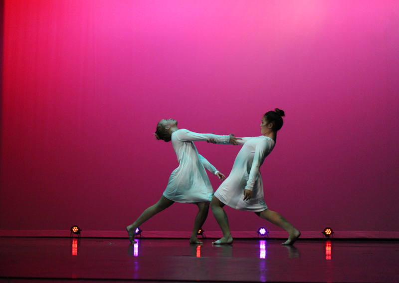 Senior Angie Matteoli and Junior Jenille Cayton perform during the song Girl on Fire. Photo by Bella Ferrari
