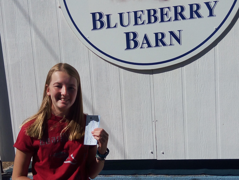 Junior Grace McDaniel made extra money by working at a blueberry farm this summer. Courtesy photo