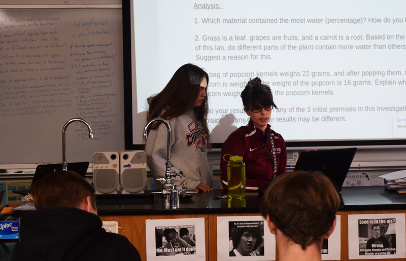 New Science Teacher Casandra Frieden assists Freshman Bella Gonzalez. Photo by Martin Foster