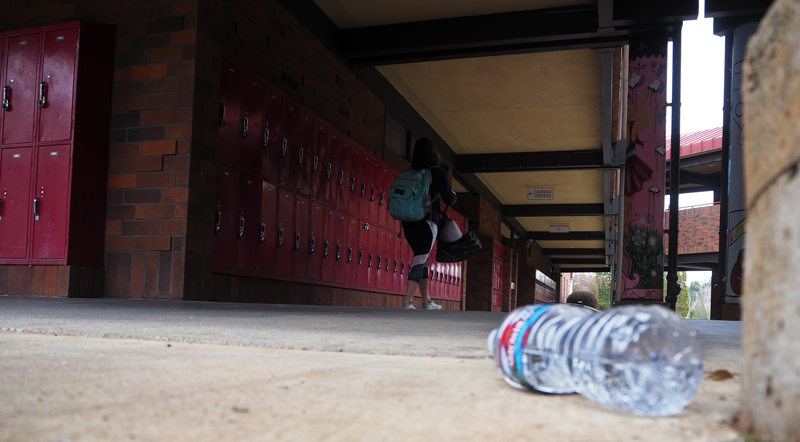 Many students at Bear River walk by plastic bottles on the ground every day.  Photo by Bella Ferrari.  