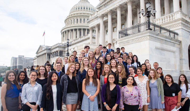 The Free Spirit Class of 2019, comprised of 51 student journalists, stands in front of the United States Capitol Building. Photo by Maria Bryk 