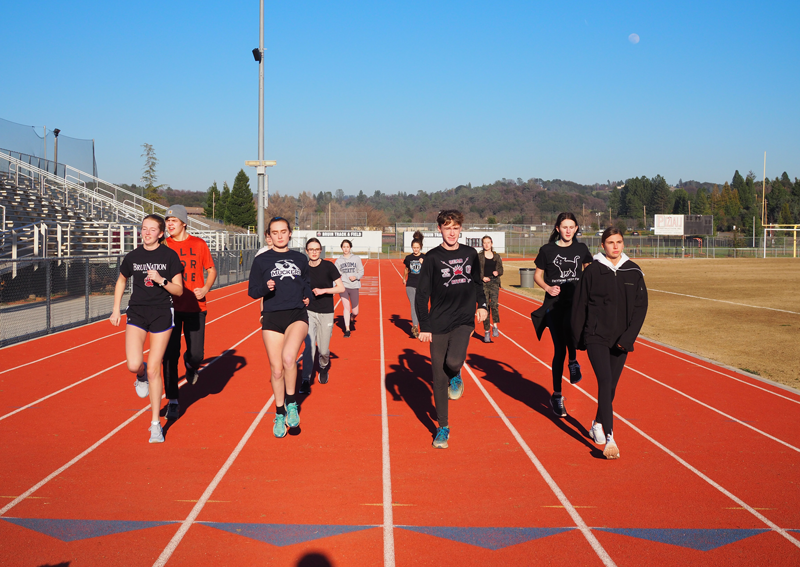 The Bear River Track and Field team practices outside on a sunny day.  Photo by Zach Fink 