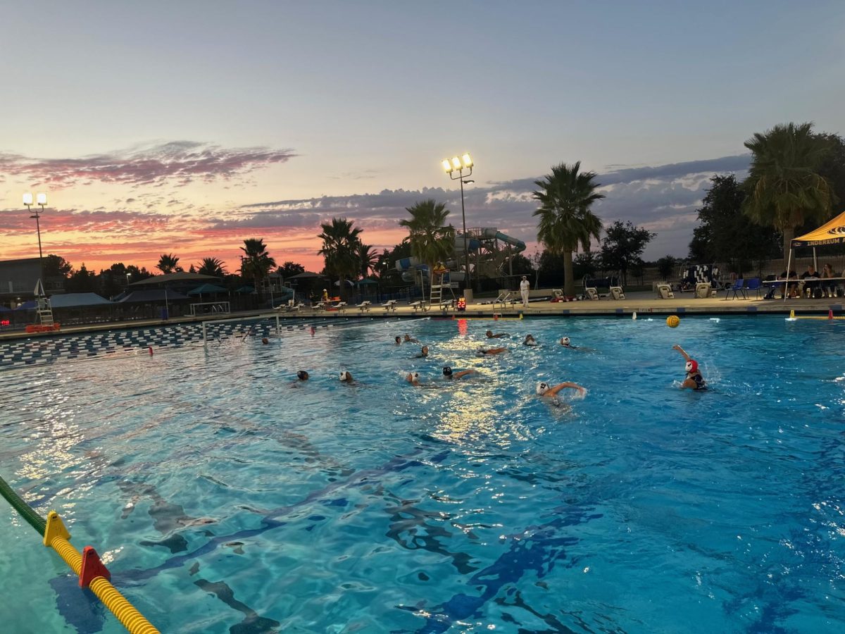 The girls water polo team fights for a win in their first game of the season.