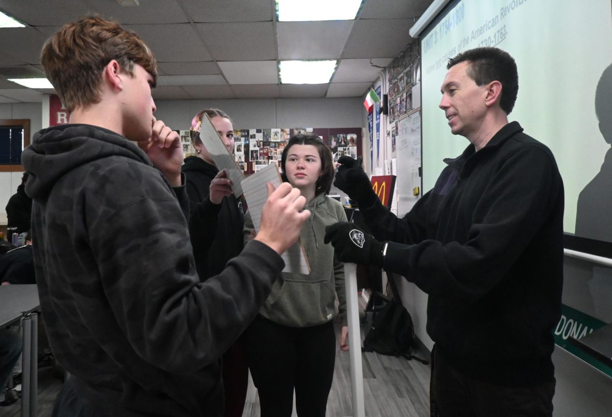 Matt MacDonald, Bear River's government teacher, engages with students during AP U.S. History.