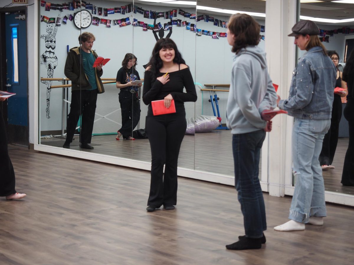 Keira Gwin and Eze Brost practicing their lines and body language. 