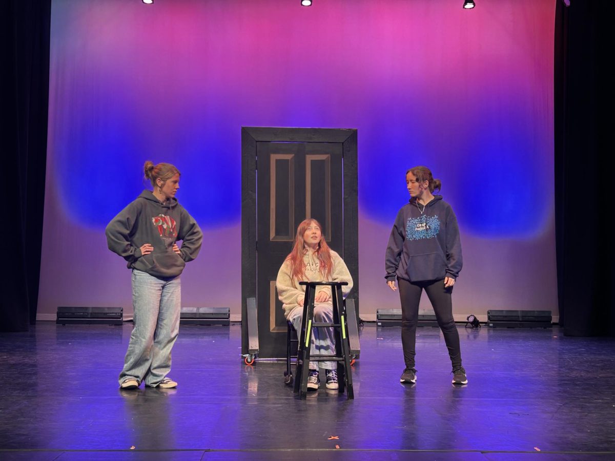 Payton Garten, Rose Werntz, and Emily Tatum practicing a scene for the showcase 
